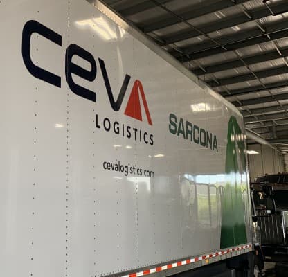 A CEVA Logistics trailer parked inside a depot