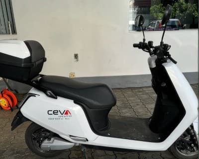 A CEVA Logistics electric scooter carrying the rebranded livery.