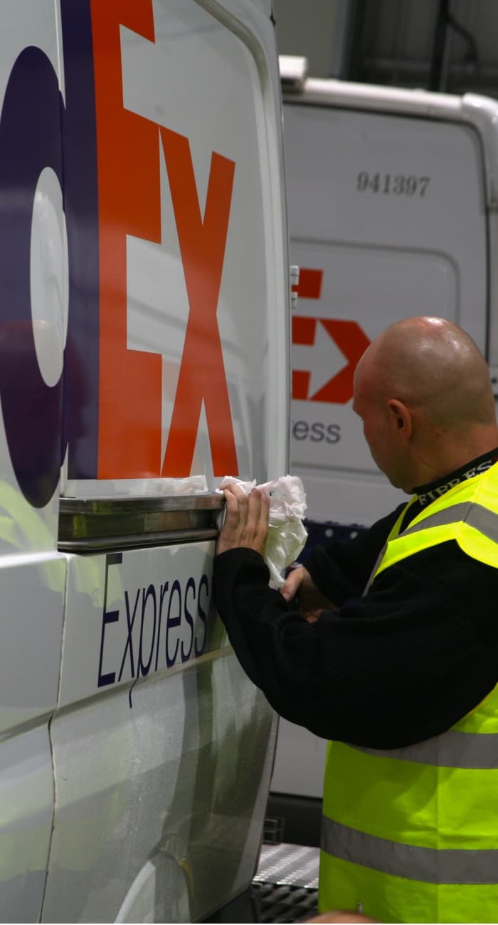 Branded fleet vehicles on the road